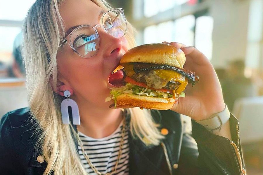 Woman eating a burger