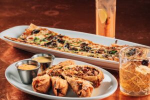 Chef selects including egg rolls, flat bread and drinks