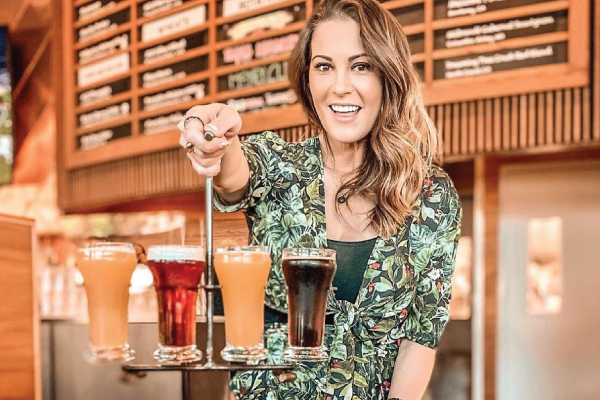 Woman with beer flights